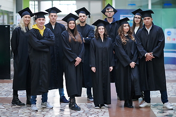 Image showing Group of diverse international graduating students celebrating