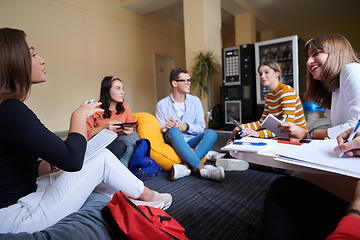 Image showing students using modern technology for school project