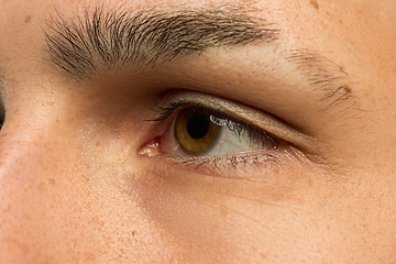 Image showing Caucasian young man\'s close up shot on blue background