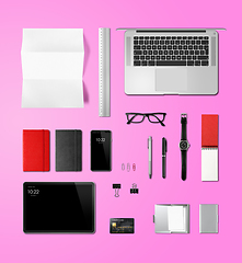 Image showing Office desk branding mockup top view isolated on pink