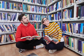 Image showing the students uses a notebook, laptop and a school library