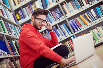 Image showing the students uses a notebook, laptop and a school library