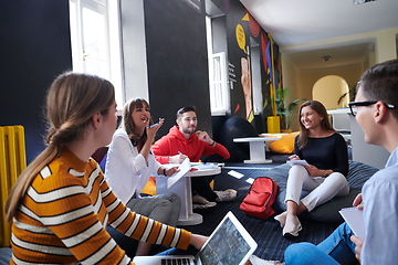 Image showing students using modern technology for school project