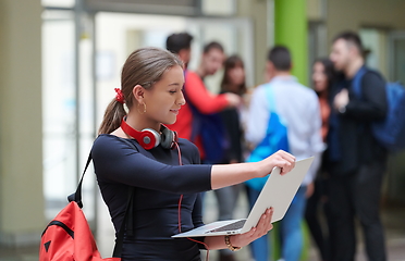 Image showing famel student with modern technology in school