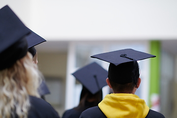 Image showing Group of diverse international graduating students celebrating