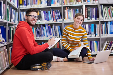 Image showing the students uses a notebook, laptop and a school library