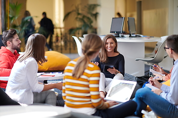 Image showing students using modern technology for school project