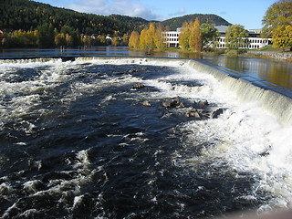 Image showing Waterfall in front of a factorybuilding