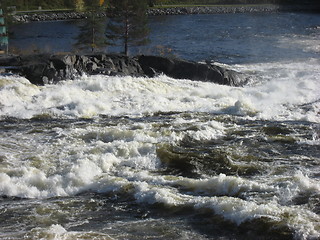 Image showing White water, against small island