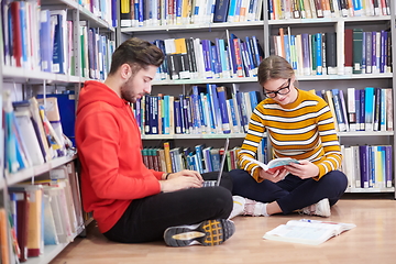 Image showing the students uses a notebook, laptop and a school library