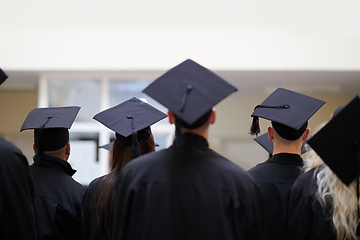 Image showing Group of diverse international graduating students celebrating