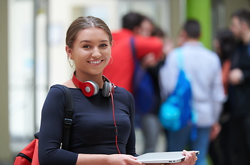 Image showing famel student with modern technology in school