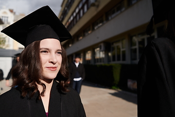 Image showing Group of diverse international graduating students celebrating