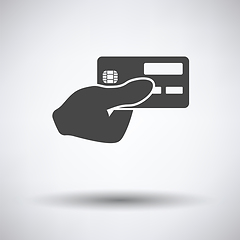 Image showing Hand holding credit card icon