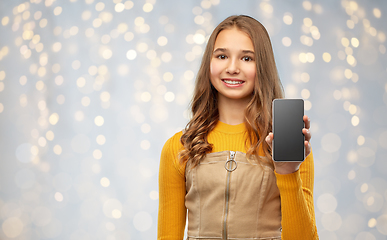 Image showing smiling teenage girl showing smartphone