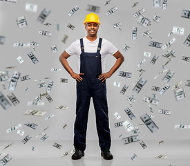 Image showing happy smiling indian worker or builder in helmet