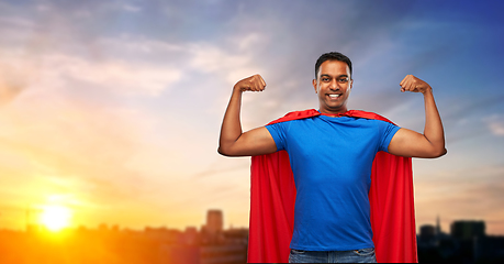 Image showing indian man in superhero cape showing his power