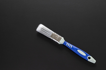 Image showing one inch brush isolated on black background