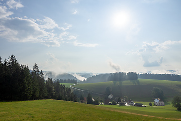 Image showing misty landscape with trees