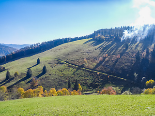 Image showing hill with fire smoke