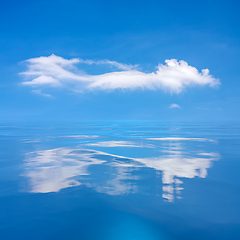 Image showing blue sky with white cloud over the sea