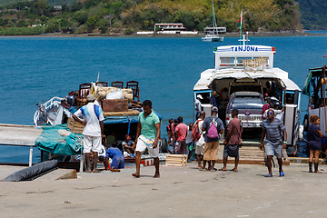 Image showing Malagasy peoples loading ship in Nosy Be, Madagascar