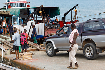 Image showing Malagasy peoples loading ship in Nosy Be, Madagascar