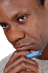 Image showing Close up portrait of African man looking thoughtful