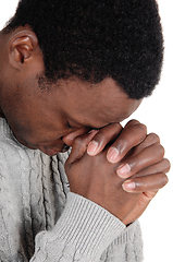 Image showing Praying African man with his hands folded