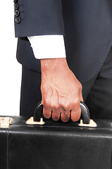 Image showing Close up of hand and briefcase of black man