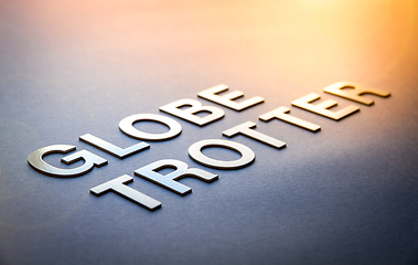 Image showing Word globe trotter written with white solid letters