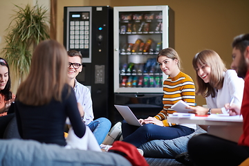 Image showing students using modern technology for school project