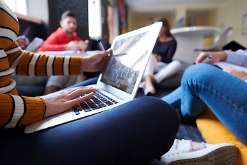 Image showing students using modern technology for school project