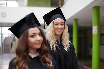 Image showing Group of diverse international graduating students celebrating