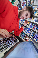 Image showing the students uses a notebook, laptop and a school library