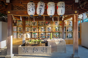 Image showing Kazaridaru barrels in Maruyama garden, Kyoto, Japan
