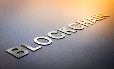 Image showing Word blockchain written with white solid letters