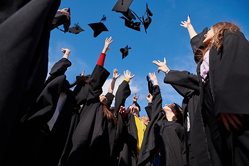 Image showing Group of diverse international graduating students celebrating