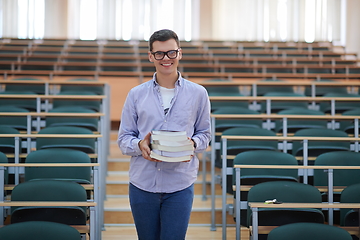 Image showing man with book in calssroom