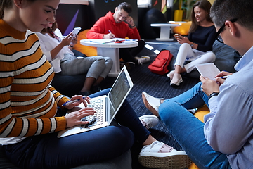 Image showing students using modern technology for school project