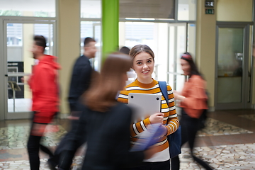 Image showing famel student with modern technology in school