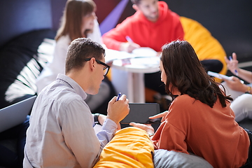 Image showing students using modern technology for school project