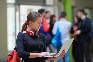 Image showing famel student with modern technology in school