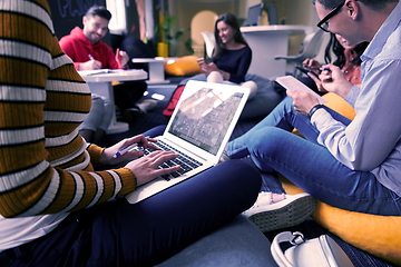 Image showing students using modern technology for school project