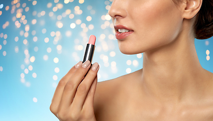 Image showing beautiful smiling young woman with pink lipstick