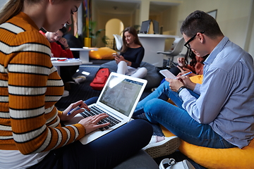 Image showing students using modern technology for school project