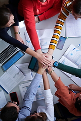 Image showing students celebrating successfully finished project