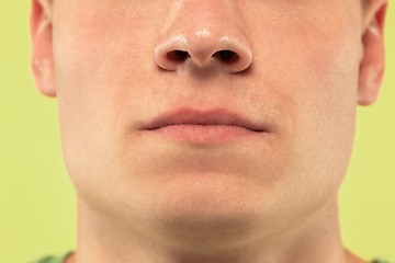 Image showing Caucasian young man\'s close up shot on green background