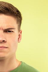 Image showing Caucasian young man\'s close up shot on green background