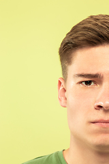 Image showing Caucasian young man\'s close up shot on green background